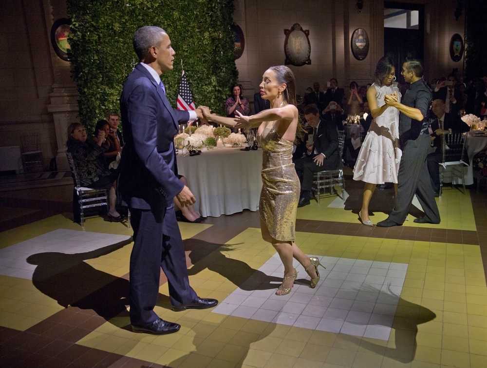 President Barack Obama and first lady Michelle Obama dance with tango dancers during the State Dinner at the Centro Cultural Kirchner, Wednesday, March 23, 2016, in Buenos Aires, Argentina. (AP Photo/Pablo Martinez Monsivais)