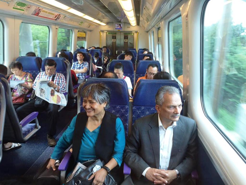 Dr.Baburam Bhattarai with his wife Hisila Yami in travelling by train at Hongkong.
