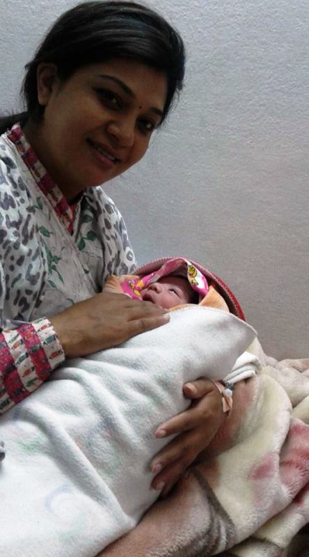 Actress Joshna Phuyal with her new born infant (son).