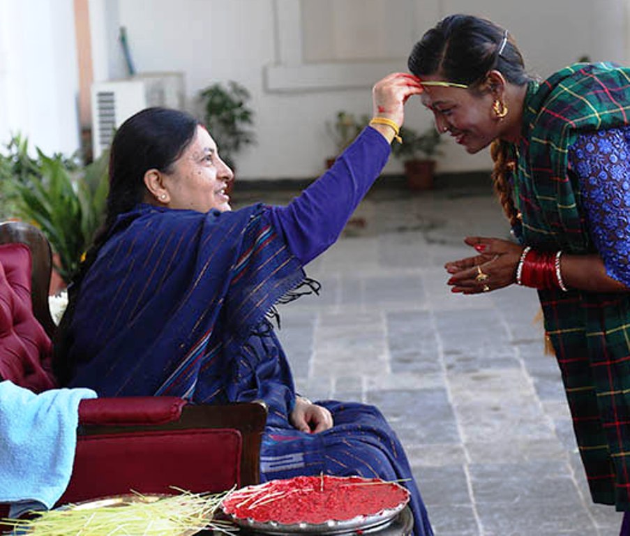 Bidhya Devi Bhandari-Presedent of Nepal, giving teeka of Bijaya Dashami.