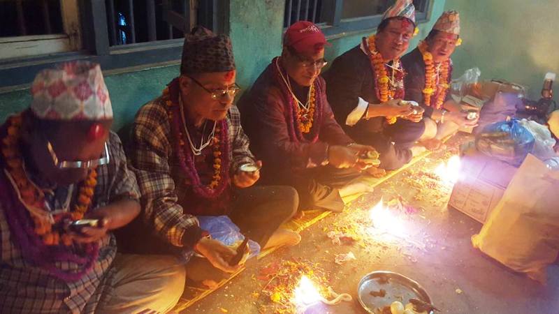 Nepalese traditional calture of Glories Mha Pooja. Worshiped self. Vetran Nepalese Artist Manish Kumar Shrestha with his relatives.